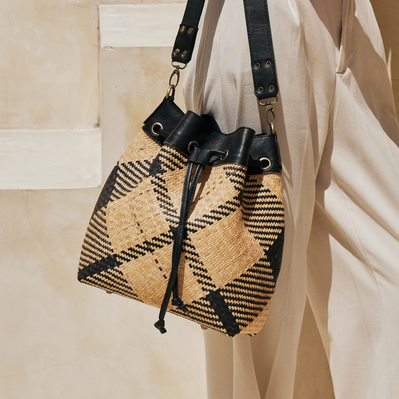 The Winding Road Bag: Black and Ivory Plaid Rattan Sling - Image 2